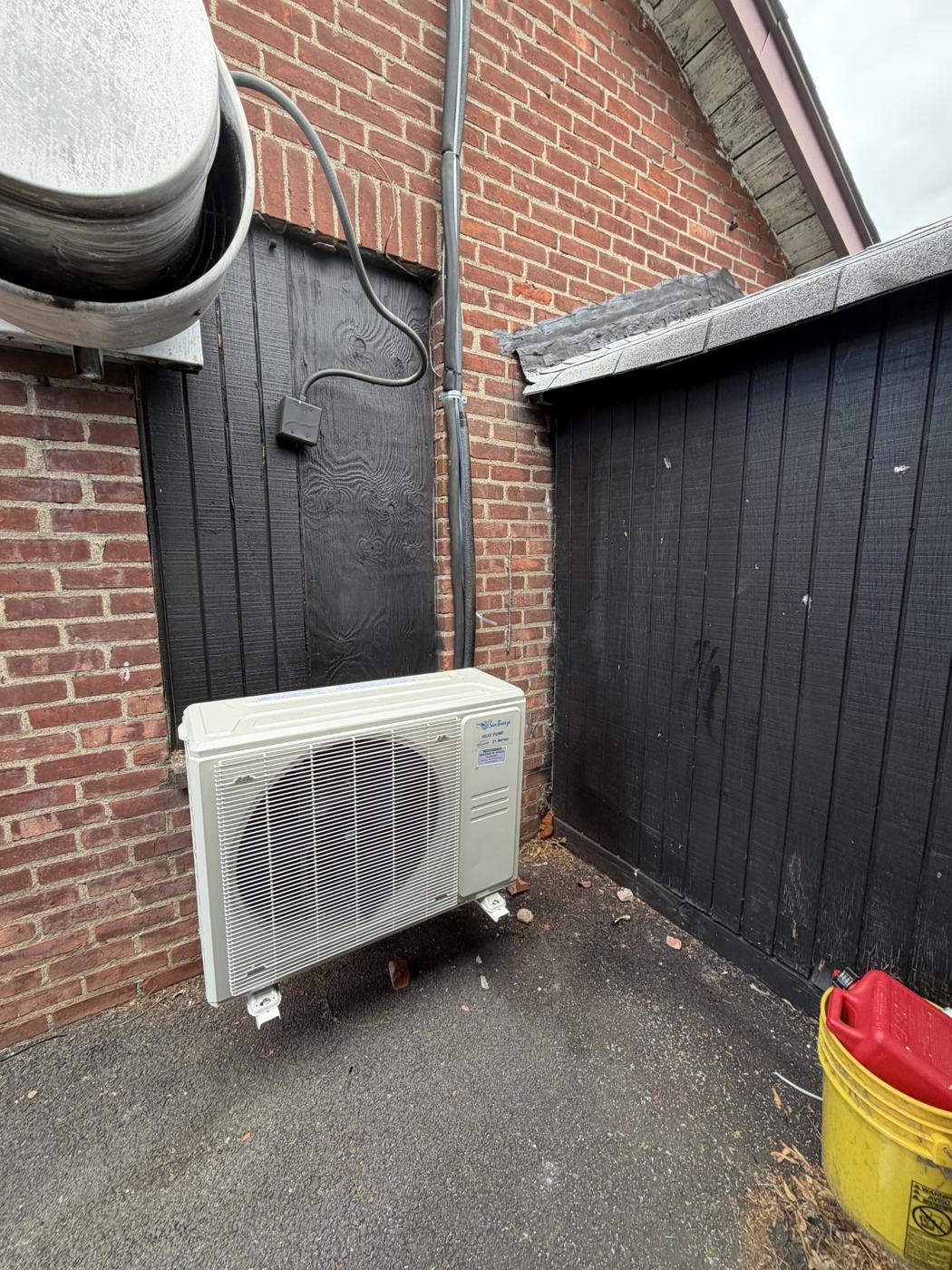 Ductless heat pump outdoor unit installed by Wayne's HVAC